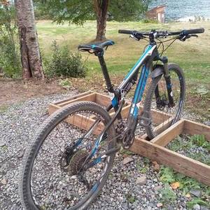 2012 Trek Superfly 100 Elite Black, Blue, and White