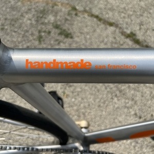 2021 LOW// Lk track Silver, gray or bare metal and Orange