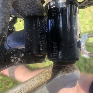 2002 Kona Bear White, Black, and Green