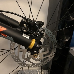 2018 Giant Fathom 2 Silver, gray or bare metal, Orange, and Black