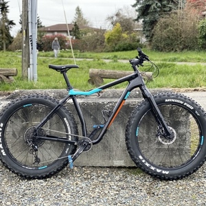 2019 Salsa Mukluk Carbon NX Eagle Black, Blue, and Orange