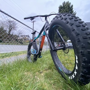 2019 Salsa Mukluk Carbon NX Eagle Black, Blue, and Orange