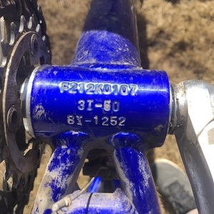 2005 Kona Kula Deluxe Blue, Red, and Silver, gray or bare metal