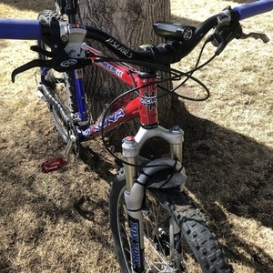 2005 Kona Kula Deluxe Blue, Red, and Silver, gray or bare metal