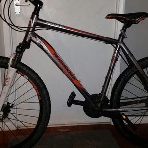 2019 Mongoose Switchback Orange and Silver, gray or bare metal