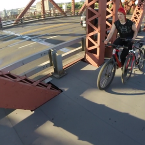 The thief and my bike.  He's pushing my bike 