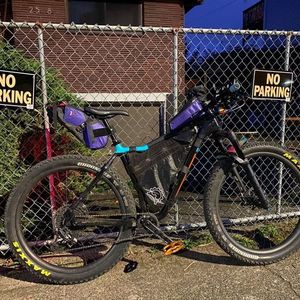 2019 Salsa Mukluk Carbon NX Eagle Black, Blue, and Orange