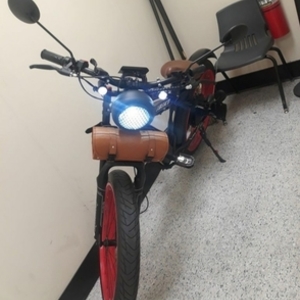 Unknown personal mobility device (electric scooter, skateboard, unicycle, etc) Black and Red