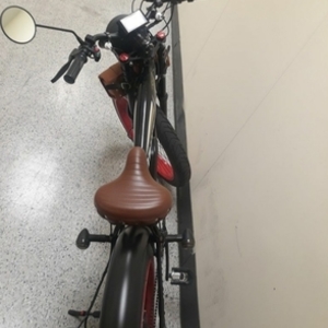 Unknown personal mobility device (electric scooter, skateboard, unicycle, etc) Black and Red