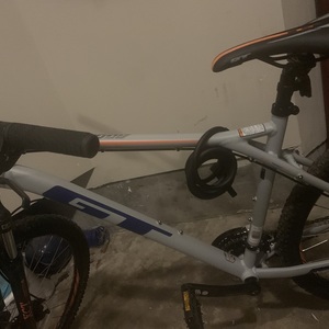 2020 GT Bicycles Aggressor Pro Silver, gray or bare metal, Blue, and Orange