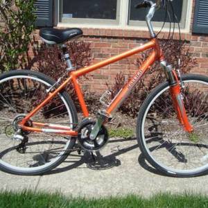 2007 Raleigh Passage Orange and Silver, gray or bare metal