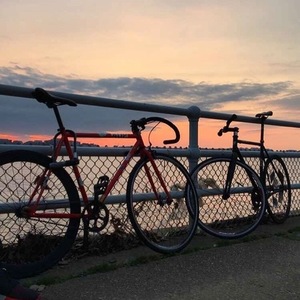 I dont even know Dont know, but a red fixie with black tapes on handle bars Red