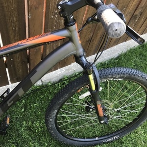 2018 GT Bicycles GT Aggressor Comp 27.5" Silver, gray or bare metal, Black, and Orange