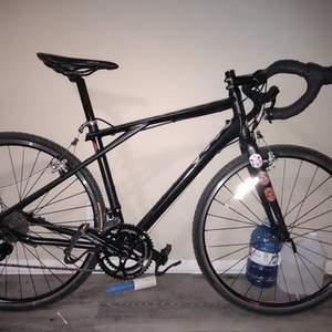 2017 GT Bicycles Traffic Vantara 700c comp hybrid Black, Purple, and Red