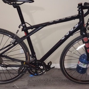 2017 GT Bicycles Traffic Vantara 700c comp hybrid Black, Purple, and Red