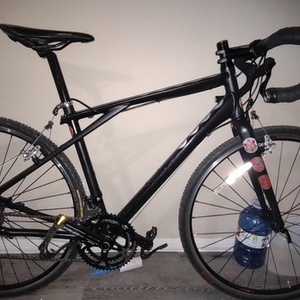 2017 GT Bicycles Traffic Vantara 700c comp hybrid Black, Purple, and Red