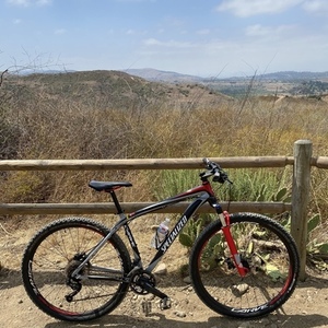 2012 Specialized Carve Comp 29 Red, Silver, gray or bare metal, and Black