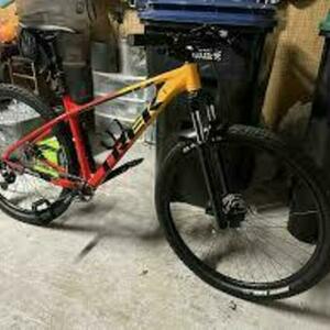 Trek Marlin Orange and Yellow or Gold