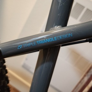 2023 GT Bicycles Aggressor Pro Silver, gray or bare metal, Teal, and Black