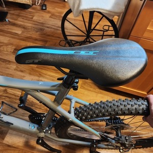 2023 GT Bicycles Aggressor Pro Silver, gray or bare metal, Teal, and Black