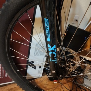 2023 GT Bicycles Aggressor Pro Silver, gray or bare metal, Teal, and Black