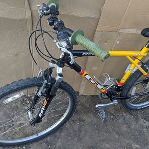 2024 GT Bicycles Aggressor Black, Yellow or Gold, and Red