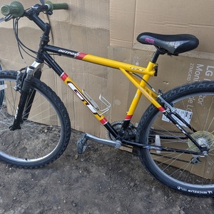 2024 GT Bicycles Aggressor Black, Yellow or Gold, and Red