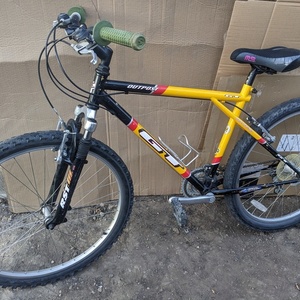 2024 GT Bicycles Aggressor Black, Yellow or Gold, and Red