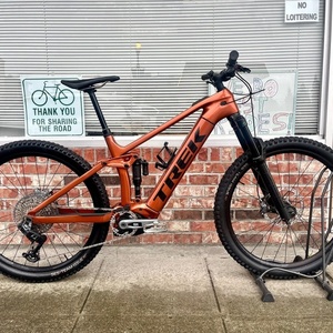 2024 Trek RAIL 9.8 LG AXS PENNYFLAKE Orange
