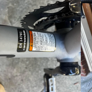 2015 Cannondale Silver, gray or bare metal, Pink, and Orange