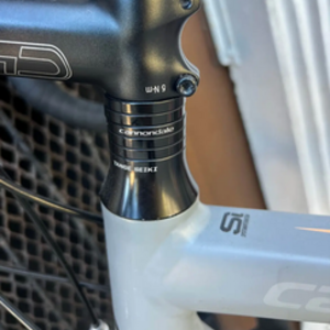 2015 Cannondale Silver, gray or bare metal, Pink, and Orange