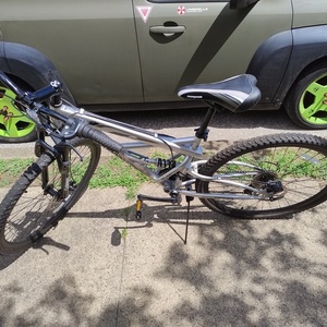 2012 Mongoose Impasse Dual Silver, gray or bare metal