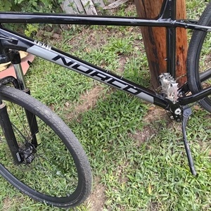 2023 Norco Bikes Storm 4 Black and Silver, gray or bare metal