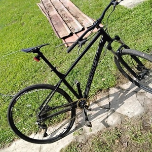 2023 Norco Bikes Storm 4 Black and Silver, gray or bare metal