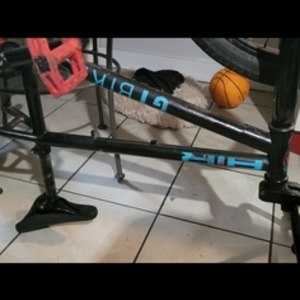 2021 GT Bicycles BMX Black, Blue, and Red