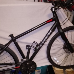 2025 Trek Black, Silver, gray or bare metal, and Red